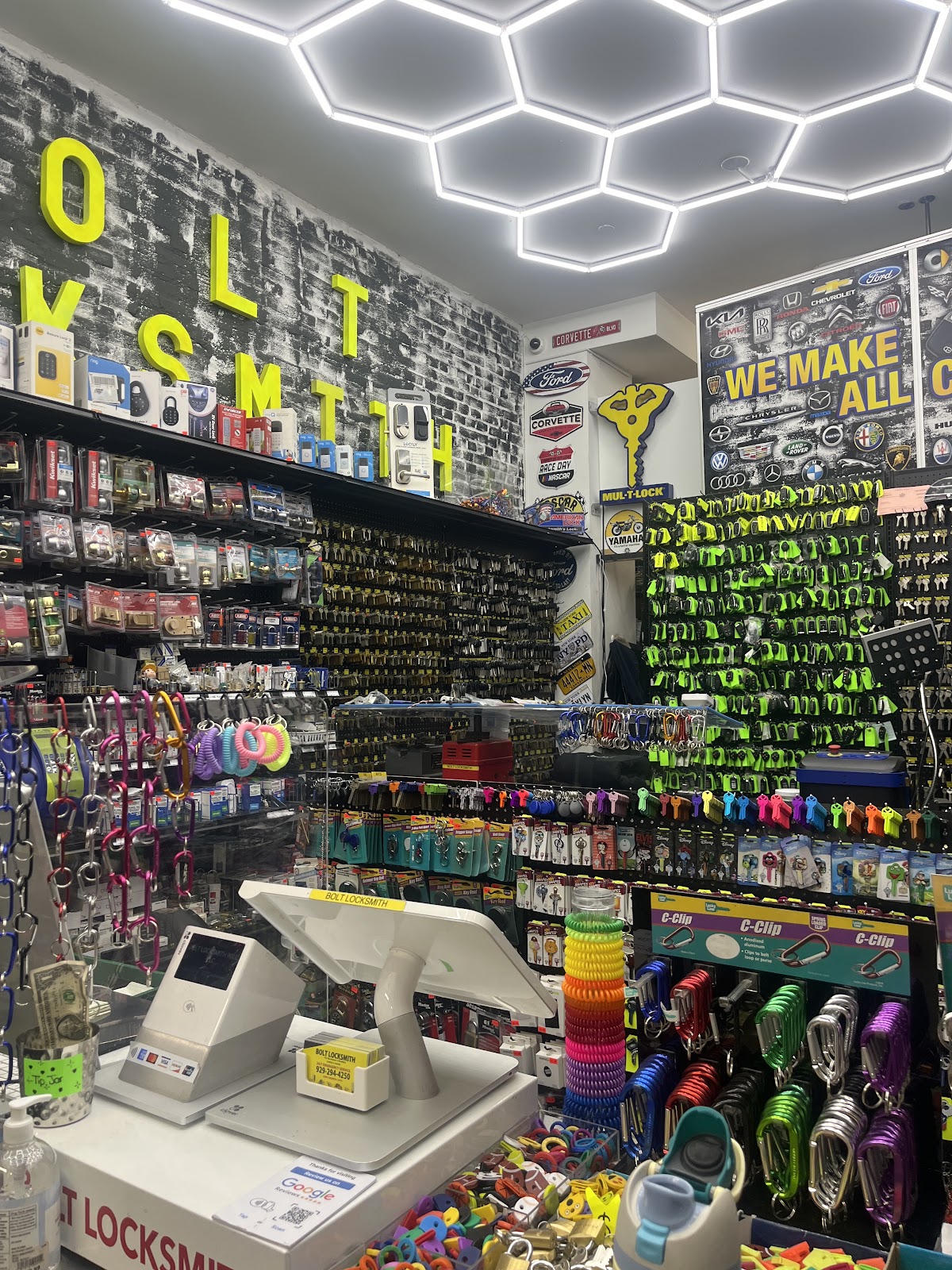 Maspeth Lock and Safe Co interior — key display wall with neon lighting